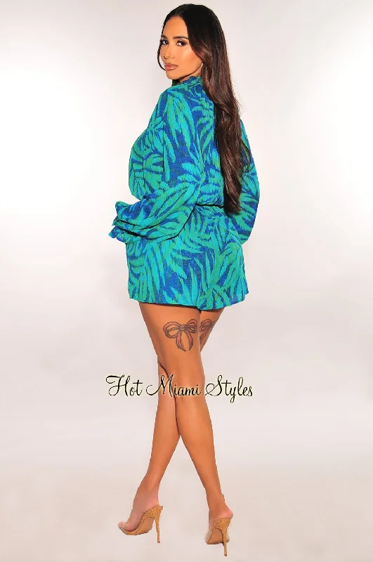 blue-green-palm-print-long-sleeve-button-up-v-neck-belted-romper